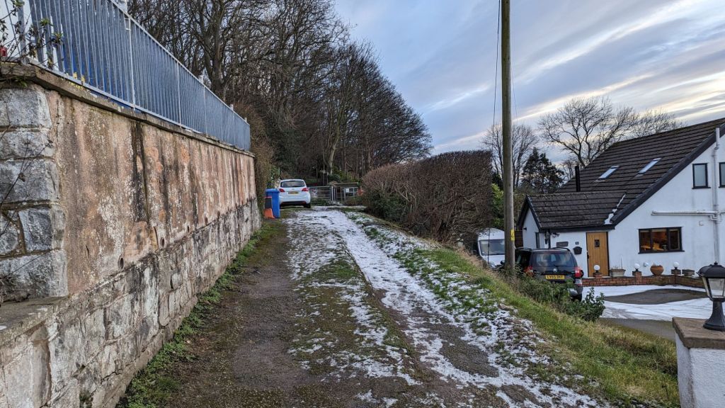 The start of the path is a small lane that turns up from Lower Foel Road and takes you to a swing gate before heading through the woods.