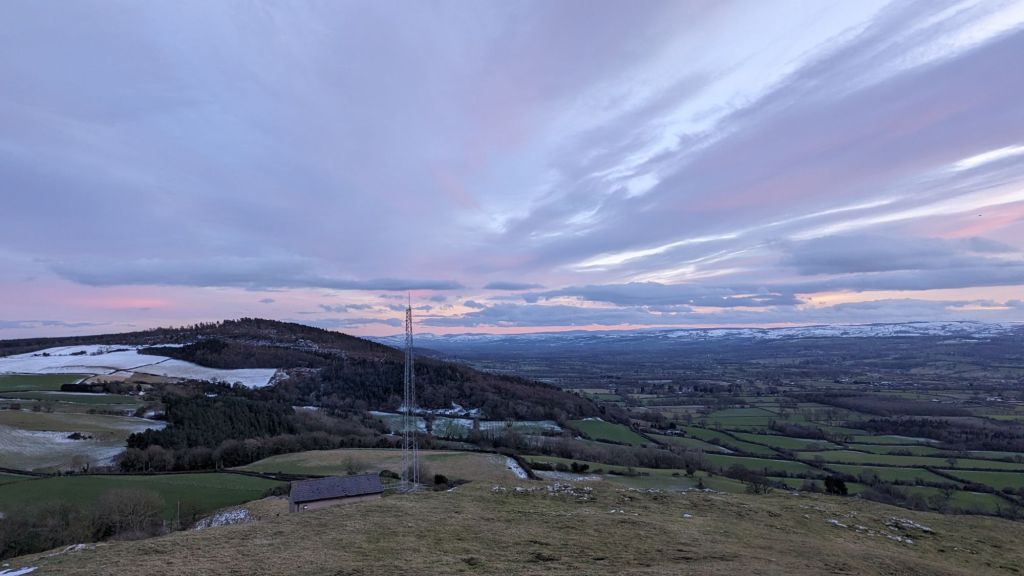 Looking at Cwm Woods from the summit of Moel Hiraddug