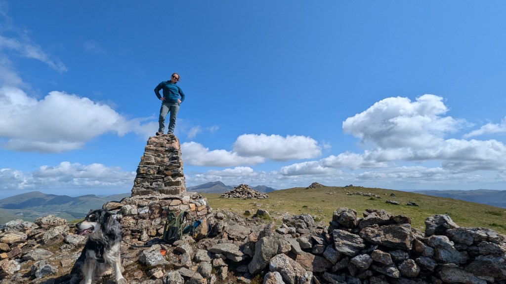 Hilary Pullen on top of the Moel Hebog Trig point
