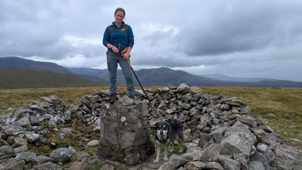hilary on the top of Moel Wnion Trig