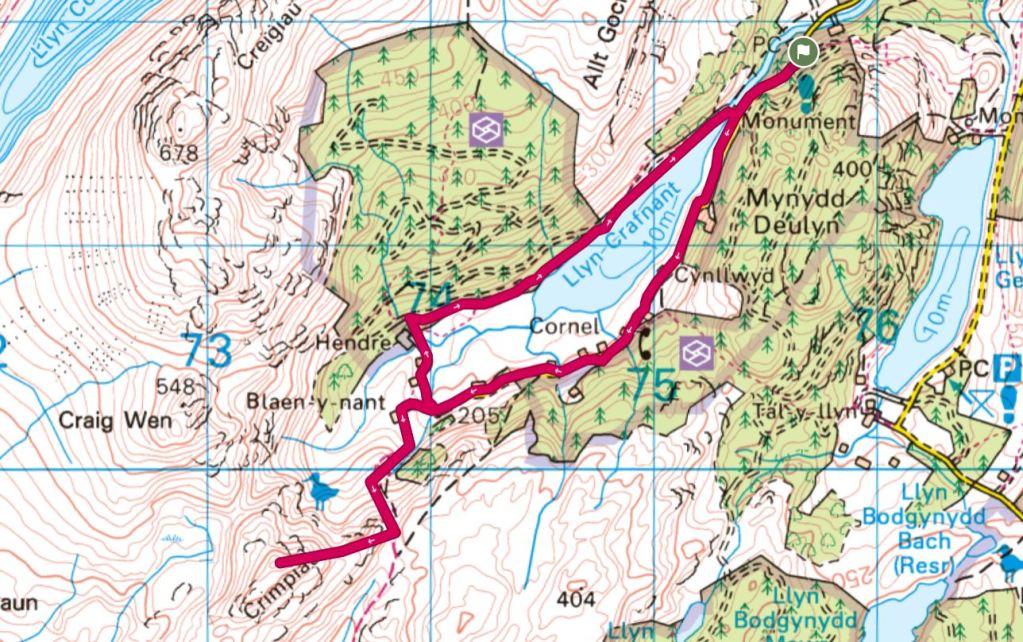 Detailed topographic map showing the area around Llyn Craflent and surrounding features like hills, trails, and water bodies, with a highlighted route.