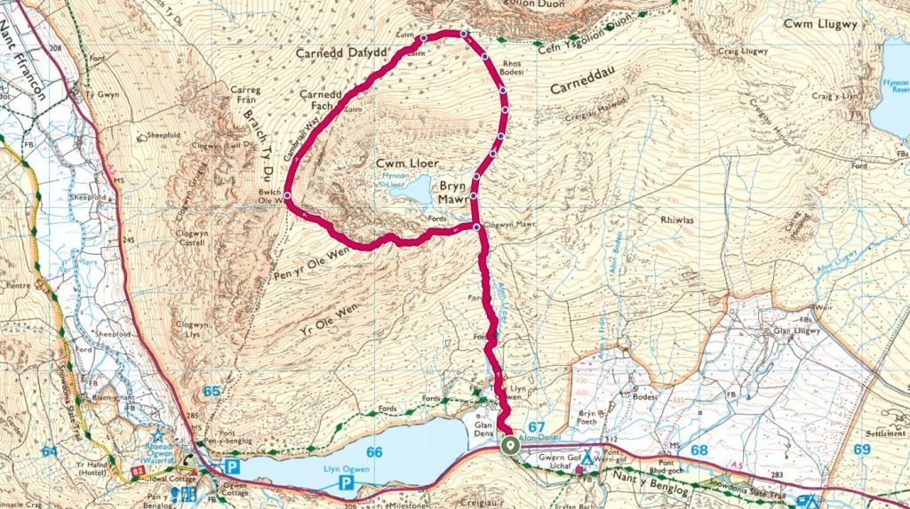 A topographic map showing the Cwm Lloer area, highlighting paths around Carnedd Dafydd and nearby topographical features, with contour lines and labeled points of interest.